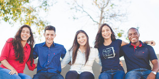 Group of international students sitting together