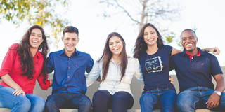 Group of international students sitting together