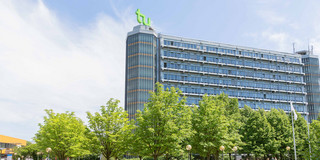 The Math Tower with trees in front.